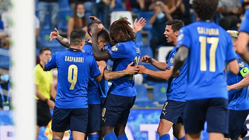 Italy's players celebrate their team's fifth goal during the FIFA World Cup Qatar 2022 Group C qualification football match between Italy and Lithuania at the Citta del Tricolore Stadium in Reggio Emilia on 8 September, 2021