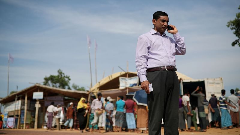 Mohib Ullah, a leader of Arakan Rohingya Society for Peace and Human Rights, talks on the phone in Kutupalong camp in Cox's Bazar, Bangladesh on 7 April 2019