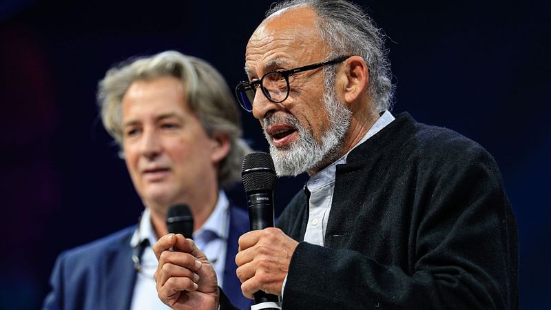 Iranian photojournalist and president of the Jury Manoocher Deghati delivers a speech during the closing ceremony of the 2021 Bayeux-Calvados Awards for war correspondents in Bayeux, northwestern France, on 9 October, 2021