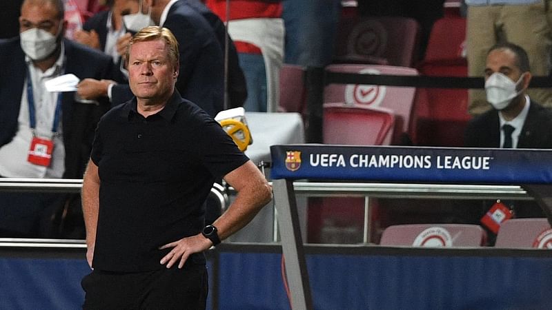 Barcelona's Dutch coach Ronald Koeman reacts after the UEFA Champions League first round group E footbal match between Benfica and Barcelona at the Luz stadium in Lisbon on 29 September 2021.