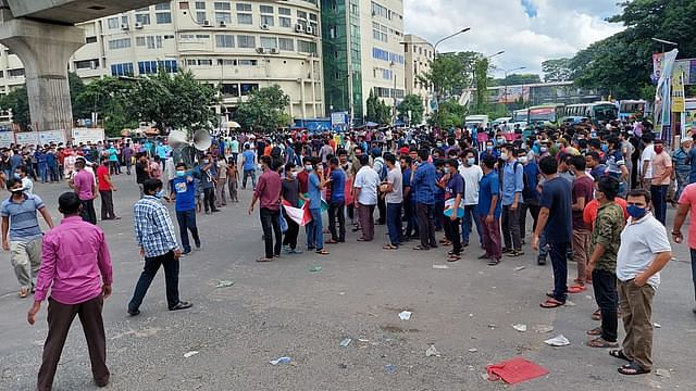 Protesters block Shahbagh intersection demanding justice over  the attacks on the Hindu community