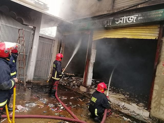 Miscreants set a  shop afire in Noakhali on Friday.