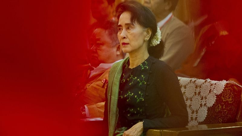 In this file photo taken on June 20, 2015, Myanmar's opposition leader Aung San Suu Kyi attends the National League for Democracy (NLD) party's Central Committee meeting in Yangon. Ousted Myanmar leader Aung San Suu Kyi has asked a judge to reduce the frequency of hearings at her trial in a junta court on health grounds, her lawyer said 4 October, 2021