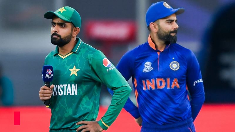 India's Virat Kohli (R) and Pakistan captain Babar Azam