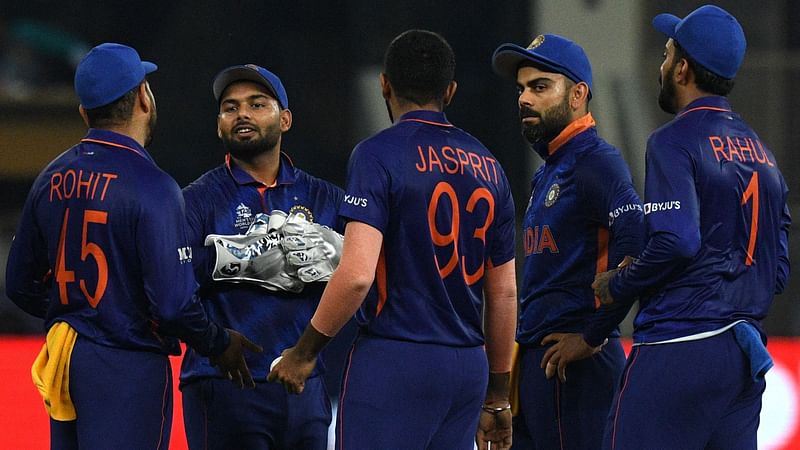 (From L-R) India's Rohit Sharma, Rishabh Pant, Jasprit Bumrah, captain Virat Kohli and KL Rahul discuss during the ICC men’s Twenty20 World Cup cricket match between India and Pakistan at the Dubai International Cricket Stadium in Dubai on 24 October, 2021