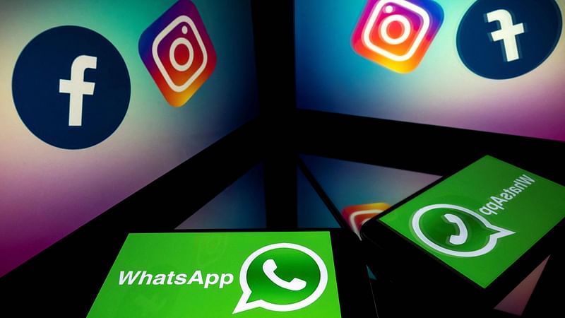 This file photo taken on 5 October 2020, shows logos of US social networks Facebook, Instagram and mobile messaging service WhatsApp on the screens of a smartphone and a tablet in Toulouse, southwestern France