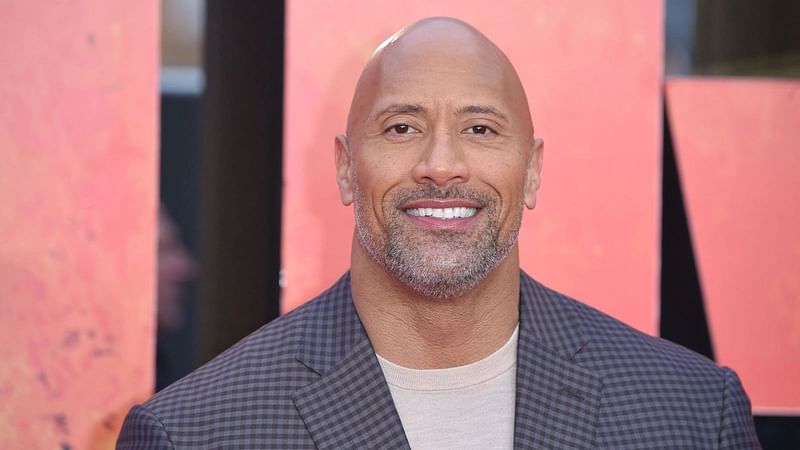 US actor Dwayne Johnson poses on the carpet arriving for the European premiere of the film Rampage in London on 11 April, 2018