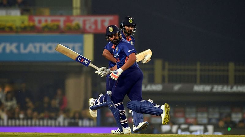 India's captain Rohit Sharma (L) and his teammate KL Rahul run between the wickets during the second Twenty20 international cricket match between India and New Zealand at the Jharkhand State Cricket Association Stadium in Ranchi on 19 November, 2021