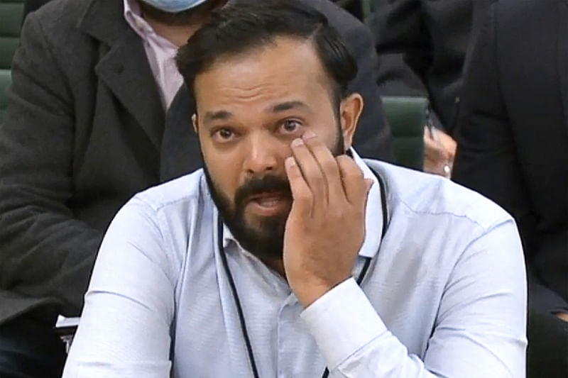 A video grab from footage broadcast by the UK Parliament's Parliamentary Recording Unit (PRU) shows former Yorkshire cricketer Azeem Rafiq fighting back tears while testifying in front of a Digital, Culture, Media and Sport (DCMS) Committee in London on 16 November, 2021