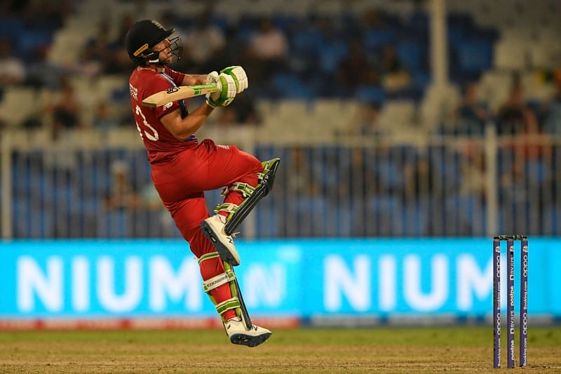 England's Jos Buttler watches the ball after playing a shot during the ICC men’s Twenty20 World Cup cricket match between England and Sri Lanka at the Sharjah Cricket Stadium in Sharjah on 1 November, 2021