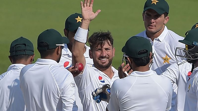 Pakitan leg-spinner Yasir Shah celebrates after taking a wicket