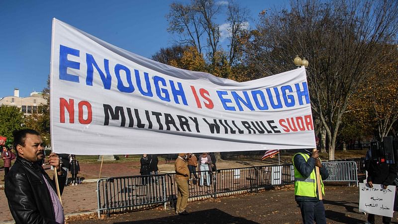 Sudanese-Americans protest against last month's military coup in Sudan in front of the White House in Washington, DC, on 13 November 2021.