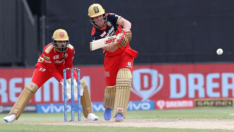 AB de Villiers of Royal Challengers Bangalore plays a shot during the Vivo Indian Premier League match between the Punjab Kings and the Royal Challengers Bangalore at the Sharjah Cricket Stadium in Sharjah on 3 October 2021