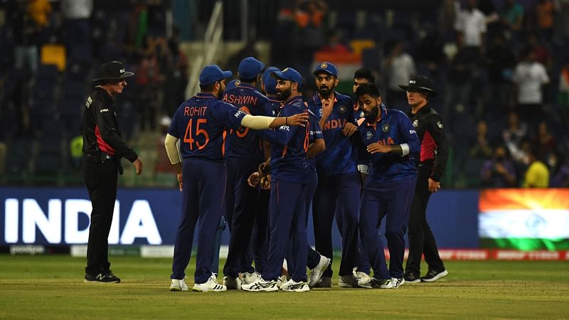 India's players celebrate their win in the ICC men’s Twenty20 World Cup cricket match between India and Afghanistan at the Sheikh Zayed Cricket Stadium in Abu Dhabi on 3 November, 2021