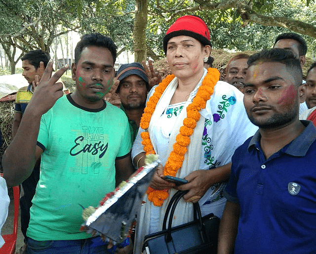 A garlanded Nazrul Islam Ritu with supporters after winning in the election