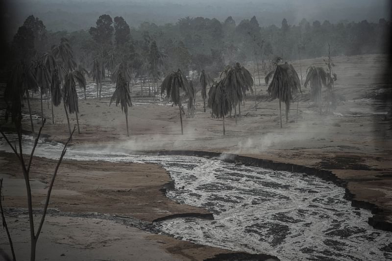 An area is seen covered in volcanic ash at Sumber Wuluh village in Lumajang on 5 December, 2021, after the Semeru volcano eruption that killed at least 13 people.