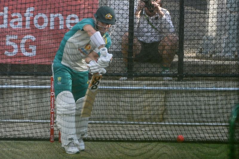 Australia's batsman David Warner plays a shot during a training session at Adelaide Oval on 14 December, 2021, ahead of the second Ashes cricket Test match against England in Adelaide