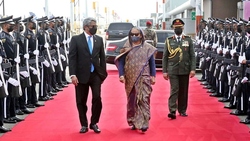 Bangladesh prime minister Sheikh Hasina visits static guard of honour at Velana International Airport, Maldives on 22 December 2021