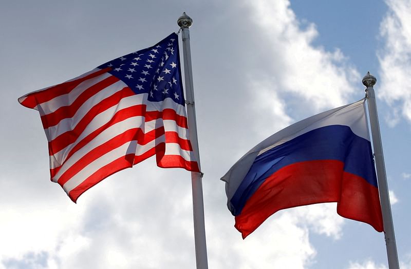 Russian and US state flags fly near a factory in Vsevolozhsk, Leningrad Region, Russia on 27 March 2019