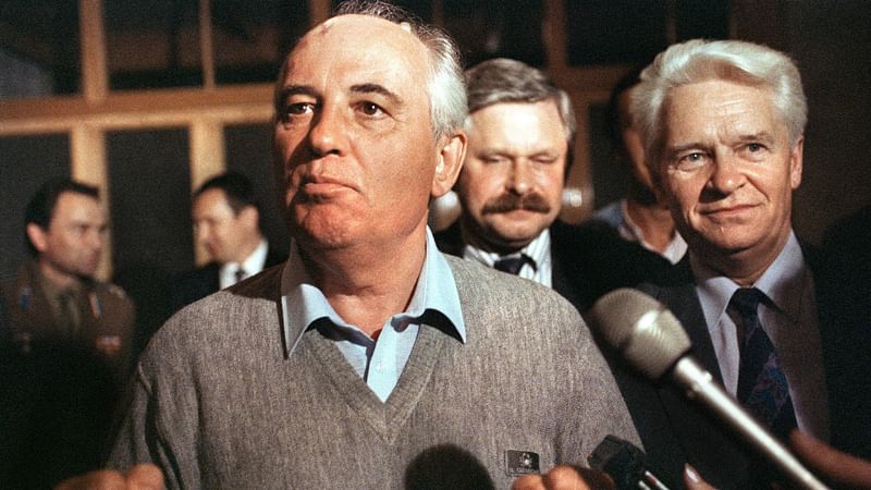 In this file photo taken on 21 August 1991 Soviet president Mikhail Gorbatchev makes his first appearance since the military coup, speaking to reporters at his country house shortly before his return to Moscow after the coup failed