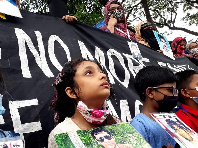 Adiba Islam along with her mother takes part in a human chain in Dhaka’s Shahbagh on 10 December 2021. Adiba Islam’s father Parvez Hossain, a BNP man who disappeared after being allegedly picked up by law enforcers in 2013.