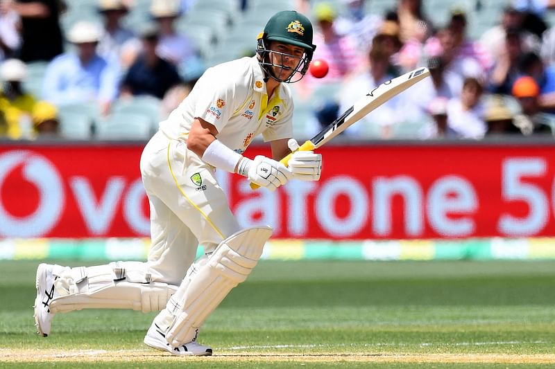 Australia's batsman Marcus Harris plays a shot on day four of the second cricket Test match of the Ashes series between Australia and England at Adelaide Oval on 19 December, 2021