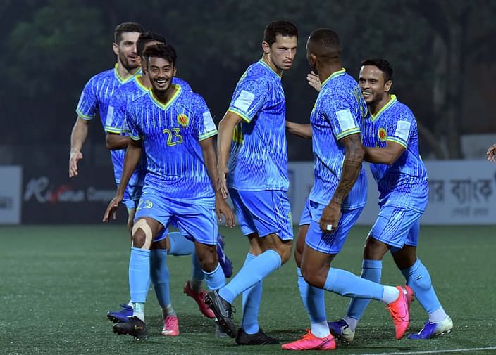 Abahani Limited's Costa Rican forward Daniel Colindres struck (third from right) celebrates a goal with his teammates during a Independence Cup Football against Bangladesh Army Football on 10 December, 2021