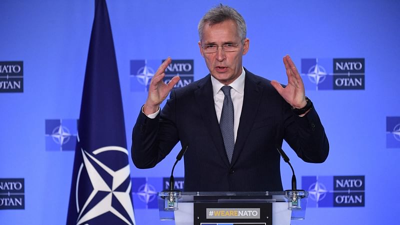 NATO Secretary General Jens Stoltenberg gestures as he speaks during a joint press conference with Ukraine's Deputy Prime Minister for European and Euro-Atlantic Integration after their bilateral meeting at the NATO headquarters in Brussels on 10 January, 2022