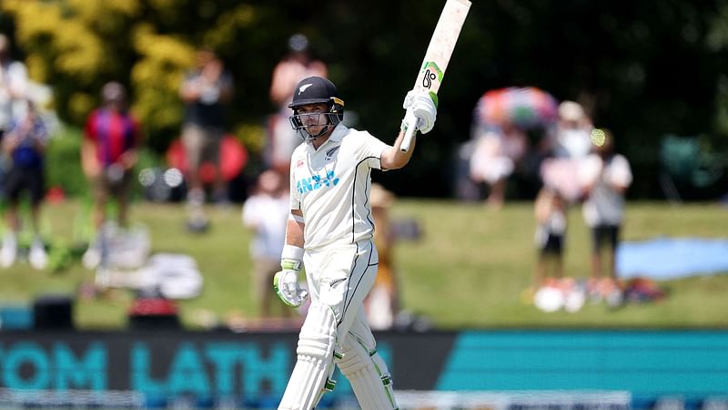 New Zealand's captain Tom Latham celebrates scoring 250 runs on day two of the second cricket test match between New Zealand and Bangladesh in Christchurch on 10 January, 2022