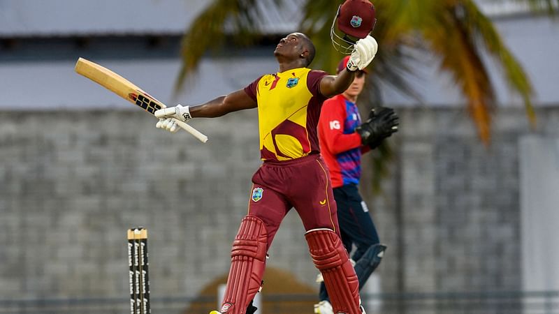 Rovman Powell of West Indies celebrates his century during the 3rd T20I between West Indies and England at Kensington Oval, Bridgetown, Barbados, on 26 January, 2022