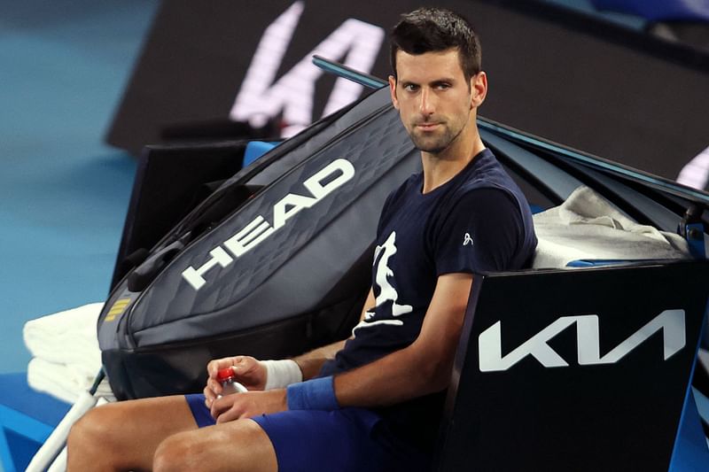 Novak Djokovic of Serbia attends a practice session ahead of the Australian Open tennis tournament in Melbourne on 14 January, 2022