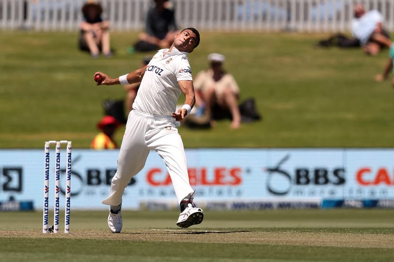 Bangladesh's paceman Taskin Ahmed bowls on day one of the first cricket Test match between New Zealand and Bangladesh at the Bay Oval in Mount Maunganui on 1 January 2022