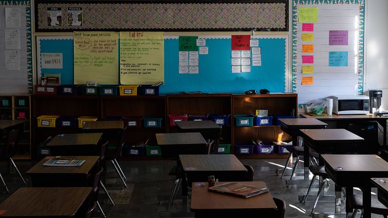 Unused desks and cubbies in empty classroom are seen during a period of NTI at Hazelwood Elementary School on 11 January, 2022 in Louisville, Kentucky