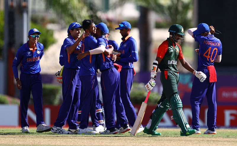 Indian players celebrate a dismissal during the Super League Quarter-Final 2 match of ICC U19 World Cup 2022 against Bangladesh, at Coolidge Cricket Ground, in Antigua on Saturday