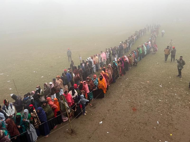 On a foggy winter morning, voters wait in a long queue to exercise their franchise in the union parished (UP) election. The picture was taken from Sultanpur high school centre of sadar upazila in Brahmanbaria on 5 January.