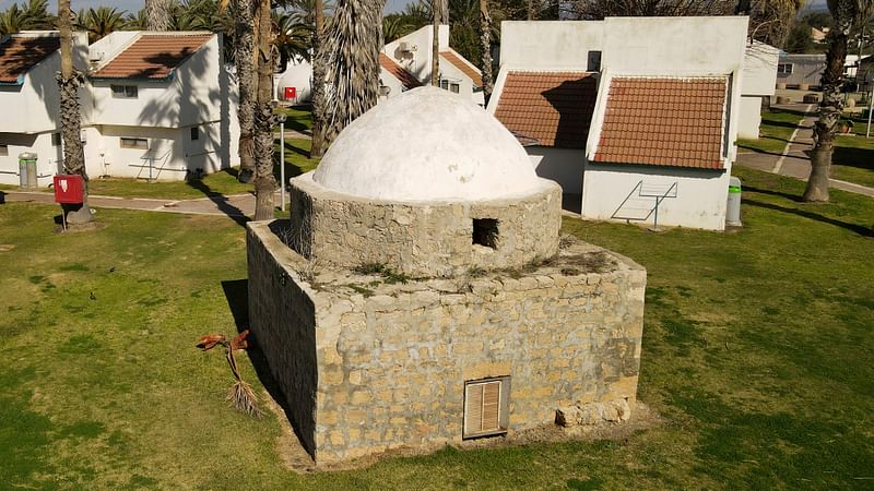 This picture taken on 25 January 2022 shows an aerial view of a Muslim Mausoleum at Dor beach, built over the village of Tantura, where an alleged massacre of Arabs took place after the surrender of the village, north of the Israeli city of Caesarea on the Mediterranean coast