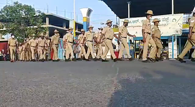 238 police personnel and about 50 police officers take part in the route march to ensure that no commotion or face-off takes place on the hijab issue, in Udupi on 11 February 2022