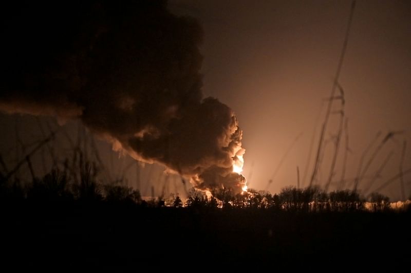 A view shows a burning oil depot reportedly hit by shelling near the military airbase Vasylkiv in the Kyiv region, Ukraine 27 February, 2022.