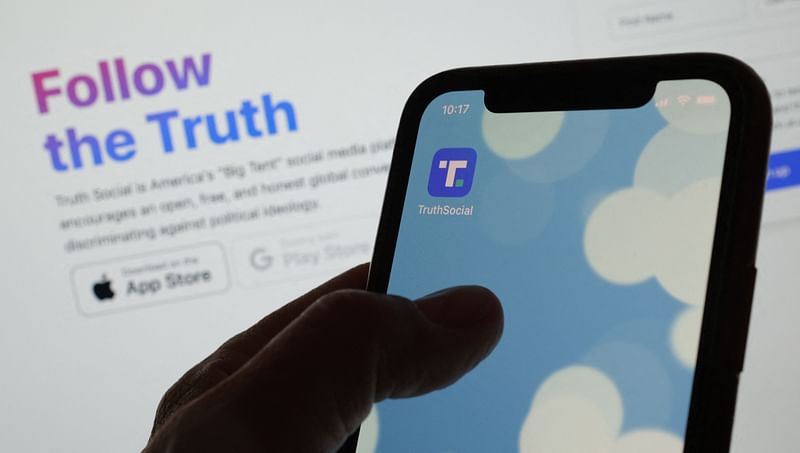 This illustration photo shows Donald Trump's new social media app Truth SocialÕs logo on a smartphone in Los Angeles, 21 February, 2022