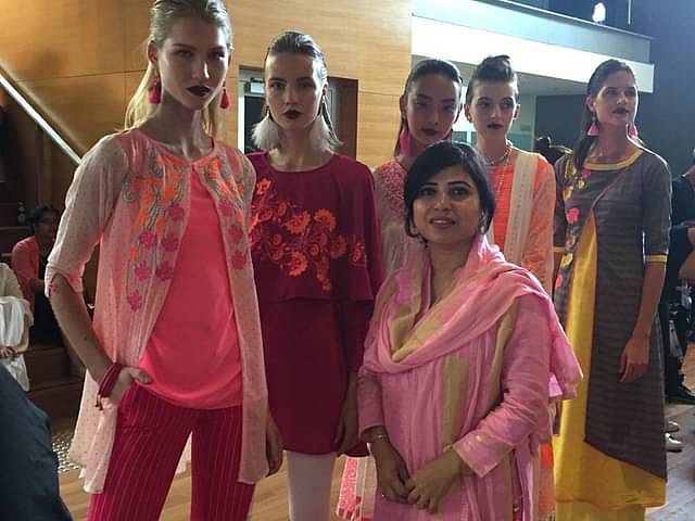 Le Reve chief executive Monnujan Nargis with Le Reve models