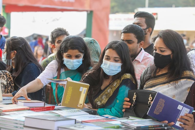 Readers choosing books at a book stall