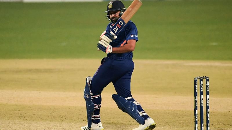 India's captain Rohit Sharma plays a shot during the first Twenty20 international cricket match between India and West Indies at the Eden Gardens in Kolkata on 16 February, 2022