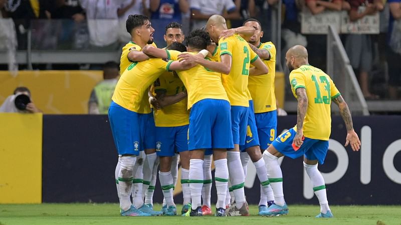 Brazil's Philippe Coutinho celebrates with teammates after scoring against Paraguay during the South American qualification football match for the FIFA World Cup Qatar 2022 at the Mineirao stadium in Belo Horizonte, Brazil, on 1 February, 2022