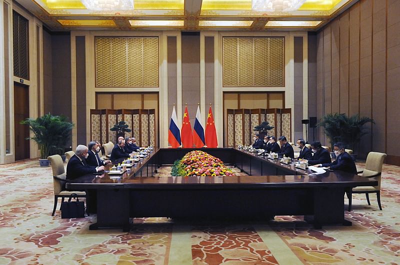 Members of delegations, led by Russian President Vladimir Putin and Chinese President Xi Jinping, attend a meeting in Beijing, China 4 February, 2022