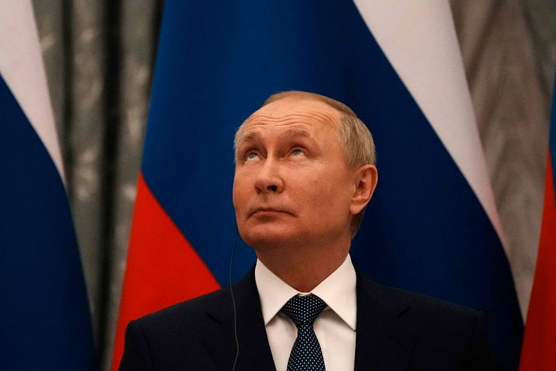 Russian President Vladimir Putin looks on during a press conference after meeting with French President in Moscow, on 7 February 2022.