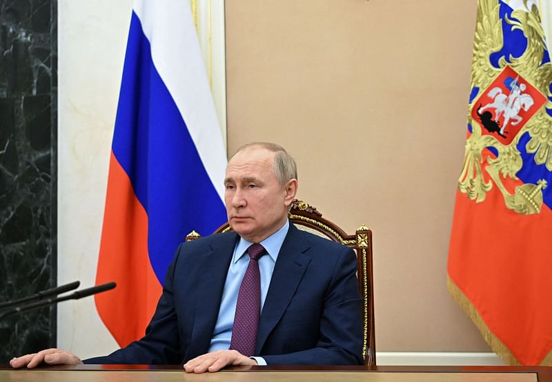 Russian President Vladimir Putin attends a meeting with Russian Defence Minister Sergei Shoigu at the Kremlin, in Moscow on 14 February, 2022