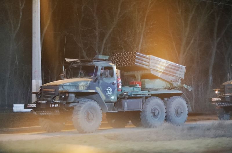 A military vehicle is seen on a street on the outskirts of the separatist-controlled city of Donetsk, Ukraine on 23 February, 2022