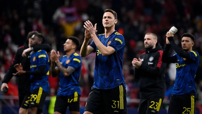 Manchester United's Serbian midfielder Nemanja Matic and teammates react at the end of the UEFA Champions League football match between Atletico de Madrid and Manchester United at the Wanda Metropolitano stadium in Madrid on 23 February, 2022