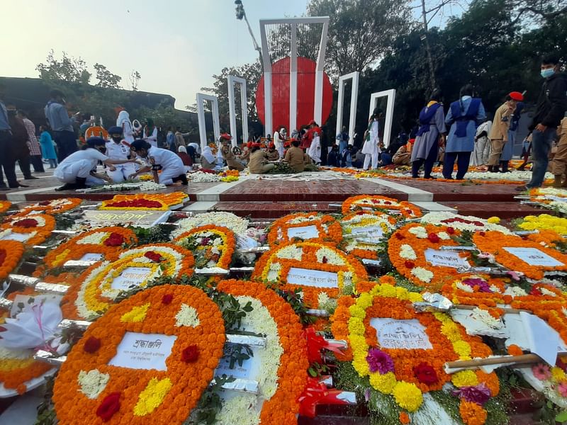 People pay tribute to the language martyrs’ by placing wreaths to the central Shaheed Minar in Dhaka. The picture was taken on 21 February.