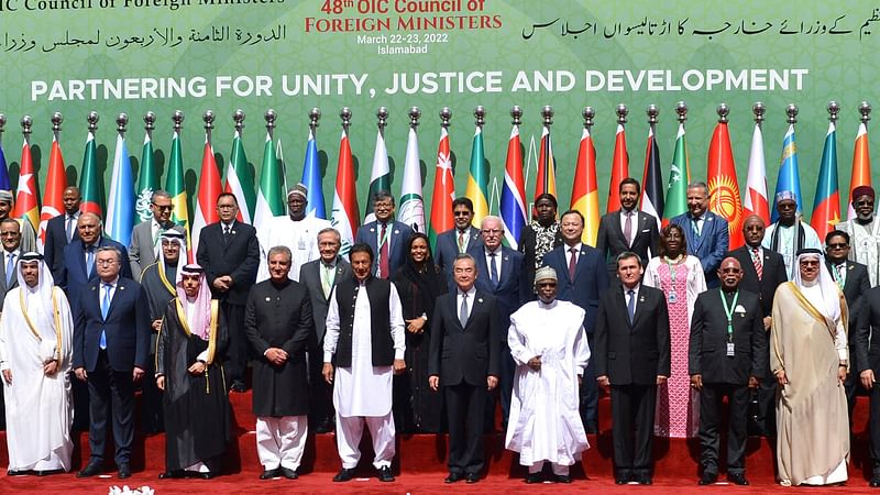 Pakistani Prime Minister Imran Khan (front 5L) poses with foreign ministers and their representatives with Organization of Islamic Cooperation (OIC) before the start of 48th session of the OIC Council of Foreign Ministers, in Islamabad on 22 March, 2022